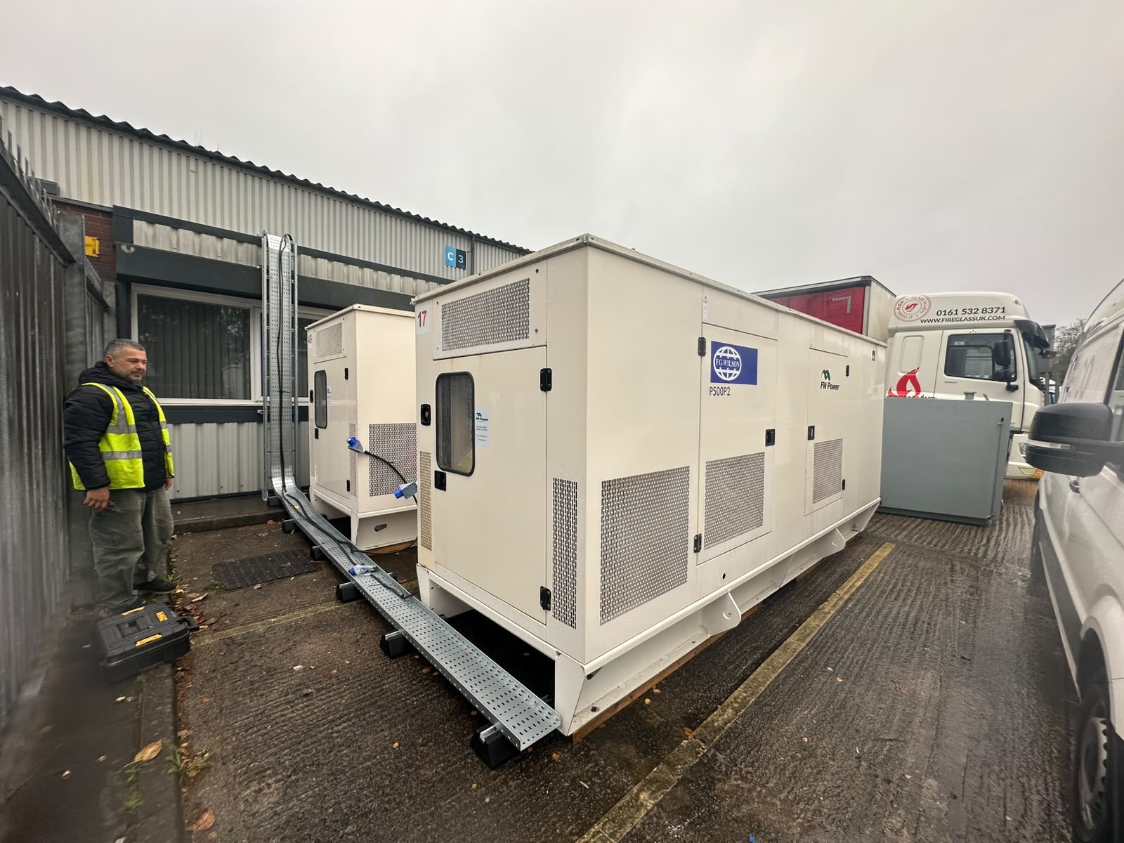 FW Power generator installation at Fire Glass North with two acoustic enclosures and an external cable tray.