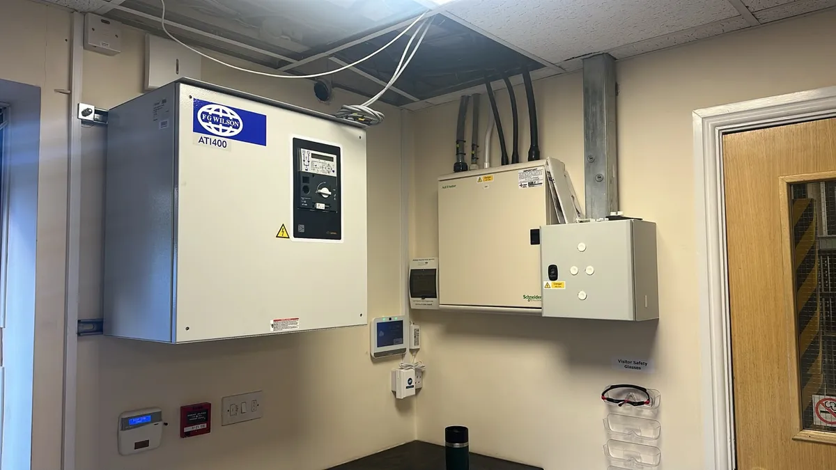 Automatic Transfer Switch installed on a plant room wall for a standby generator