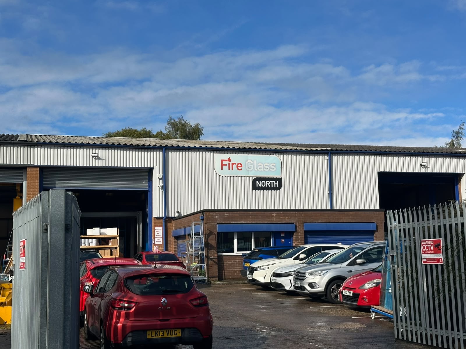 Fire Glass North premises with its sign above the entrance and loading bays.