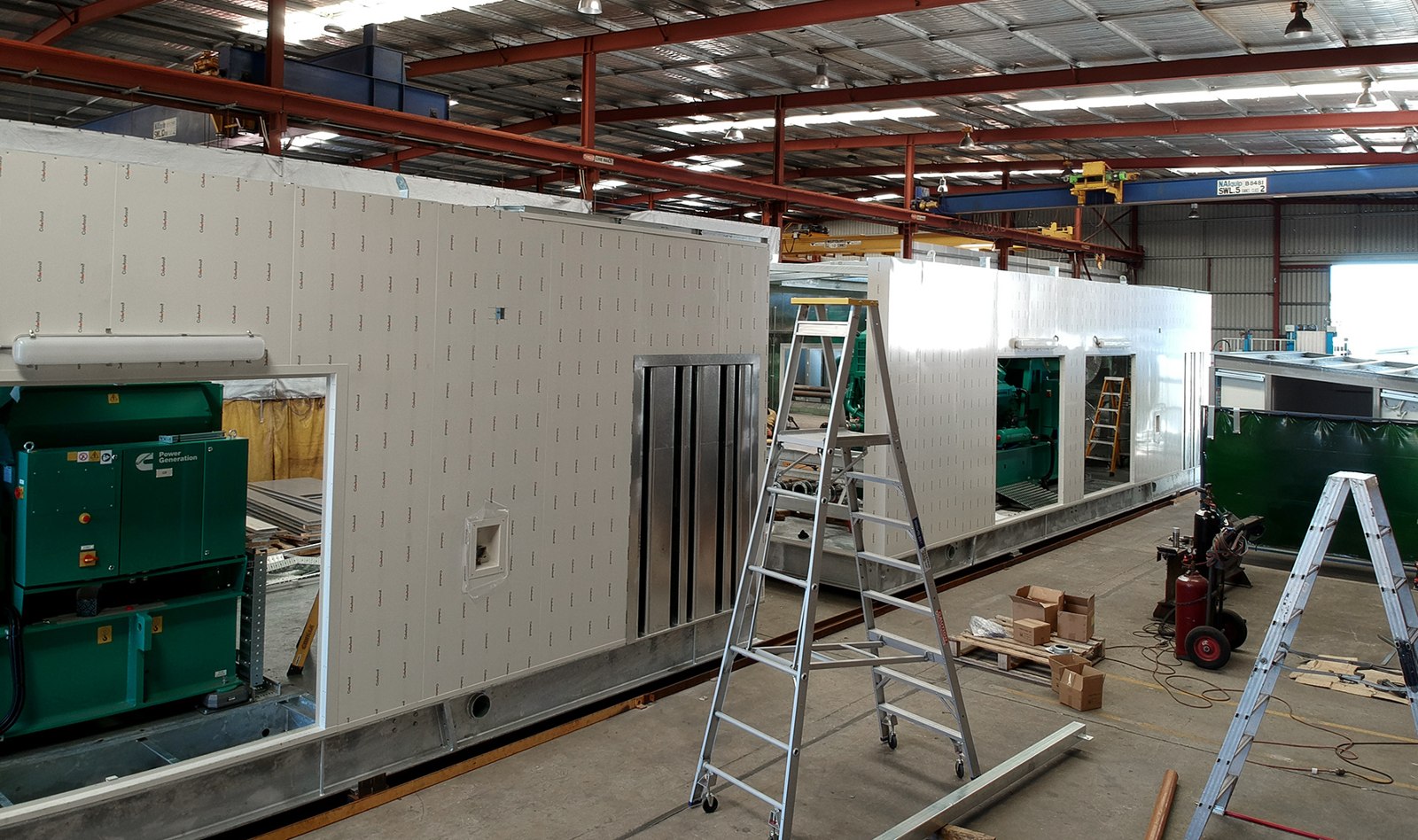Acoustic generator enclosures during manufacture