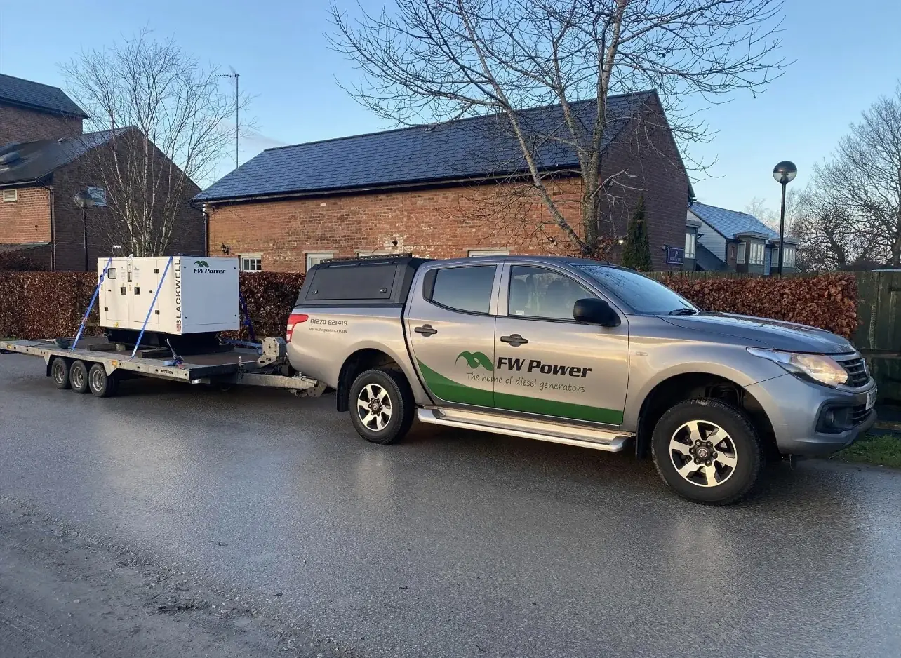 FW Power pickup truck towing a Blackwell diesel generator on a trailer