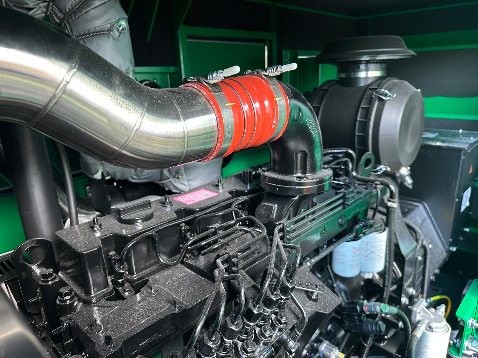 Close-up of the Cummins diesel engine inside the Blackwell standby generator
